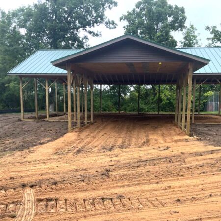 new pole building structure over freshly excavated ground for pad