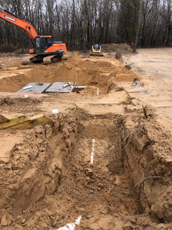 excavation of sewer septic line