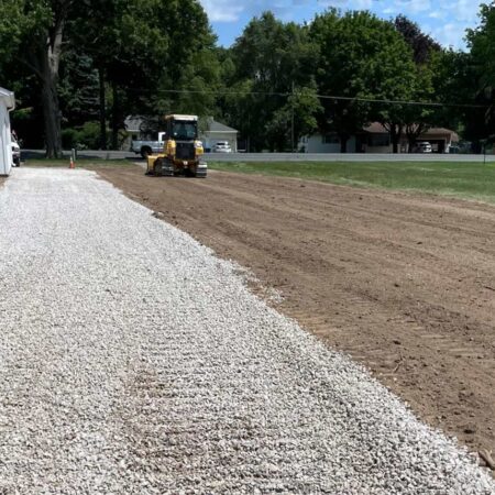 gravel driveway installation at new home