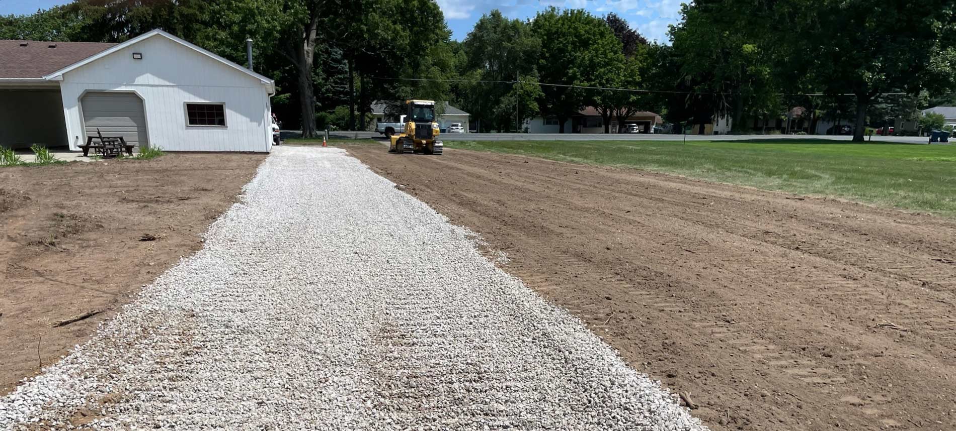 gravel driveway installation at new home