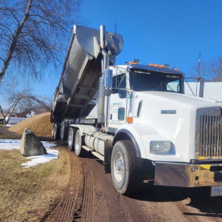 large dump truck delivering gravel