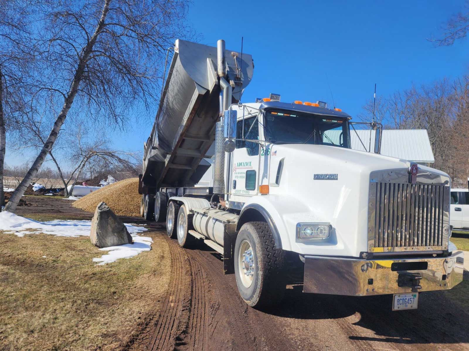 large dump truck delivering gravel