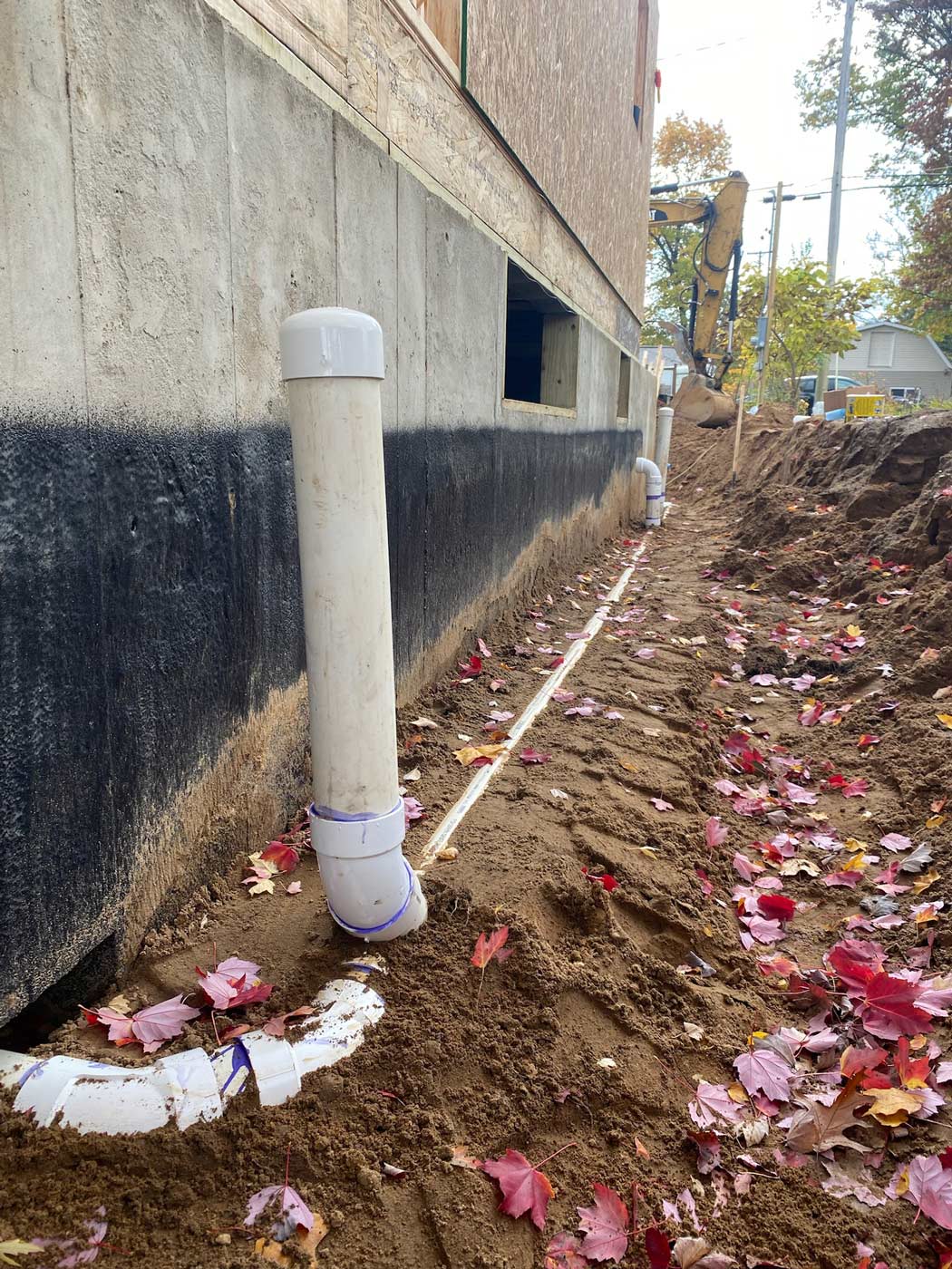 septic or sewer line outside foundation